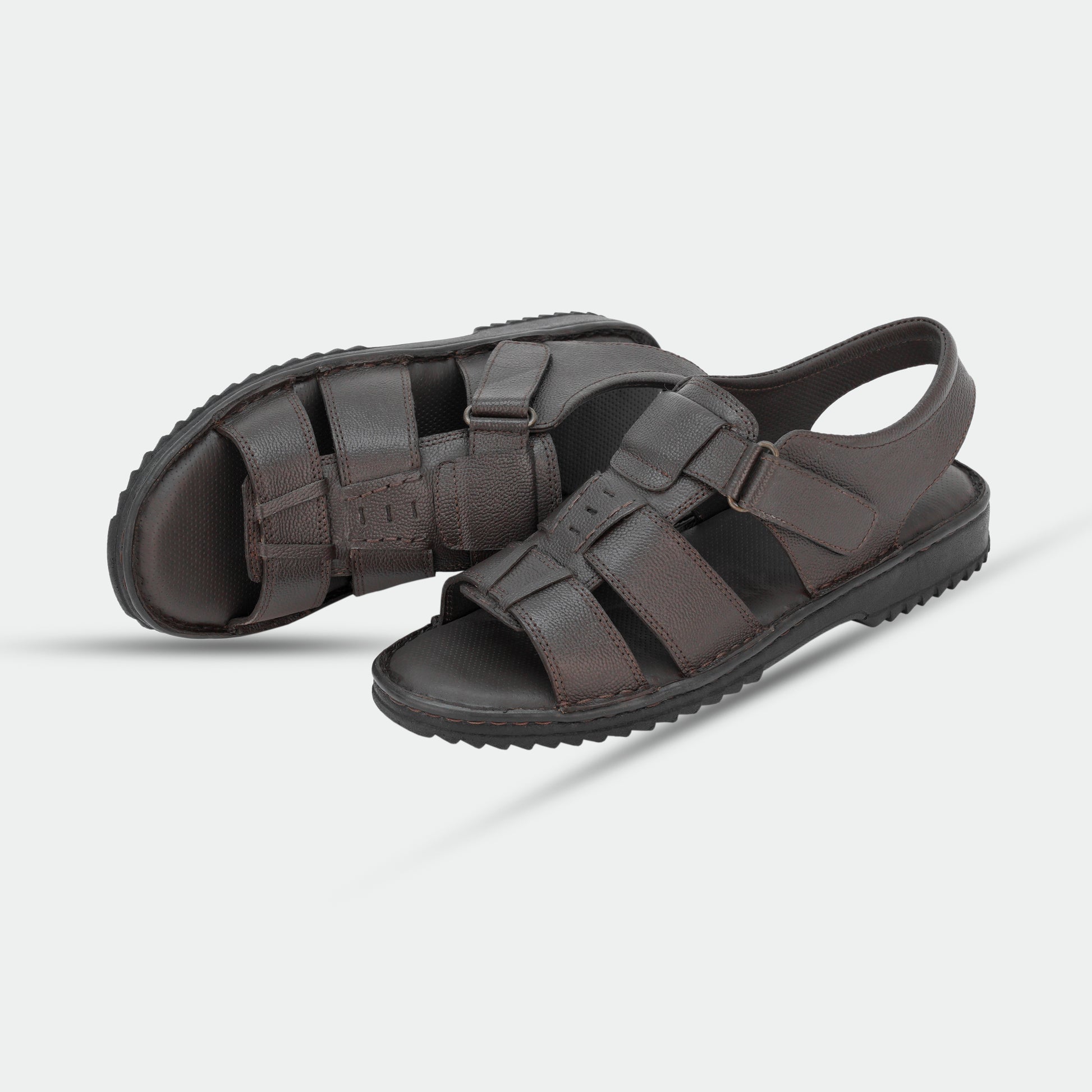 Brown sandals in 100% genuine leather, handmade for comfort and durability—classic, timeless design suitable for traditional wear or everyday use.