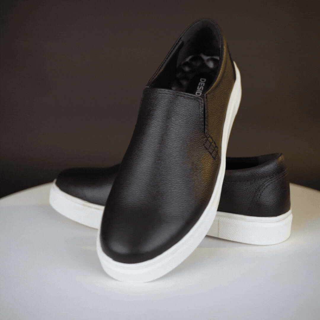 Stylish slip-on sneakers in premium Cow Chelsia leather with soft sheep leather lining, non-woven insole, and durable TPR sole in black—comfortable, flexible, and suitable for both formal and casual occasions.