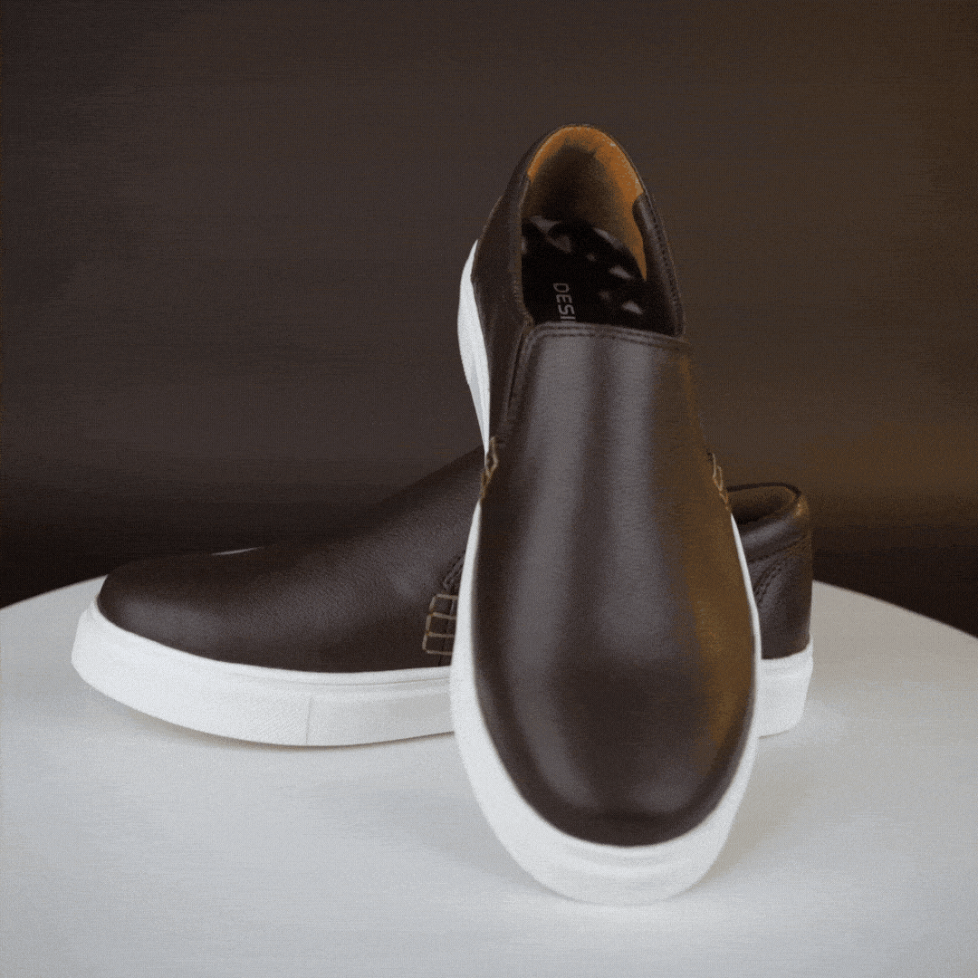 Stylish slip-on sneakers in premium Cow Chelsia leather with soft sheep leather lining, non-woven insole, and durable TPR sole in black-brown—comfortable, flexible, and suitable for both formal and casual wear.