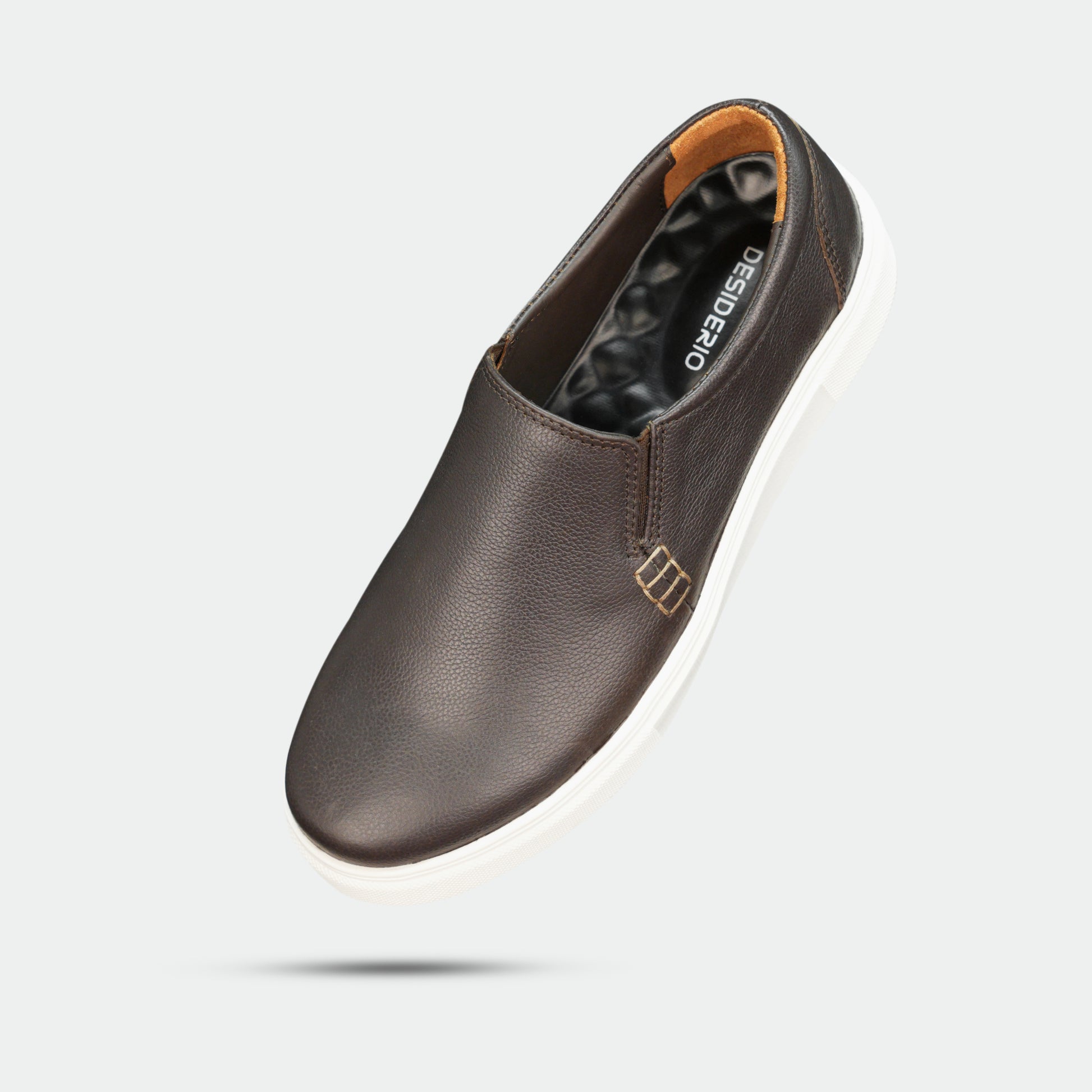 Stylish slip-on sneakers in premium Cow Chelsia leather with soft sheep leather lining, non-woven insole, and durable TPR sole in black-brown—comfortable, flexible, and suitable for both formal and casual wear.