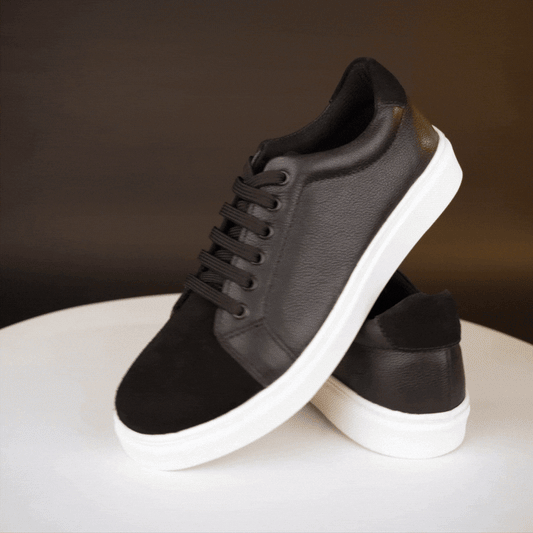 Sneakers made from a blend of cow grain and cow suede leather with breathable mesh lining, non-woven insole, and flexible TPR sole—finished in classic black-brown, durable, comfortable, and versatile for everyday wear.