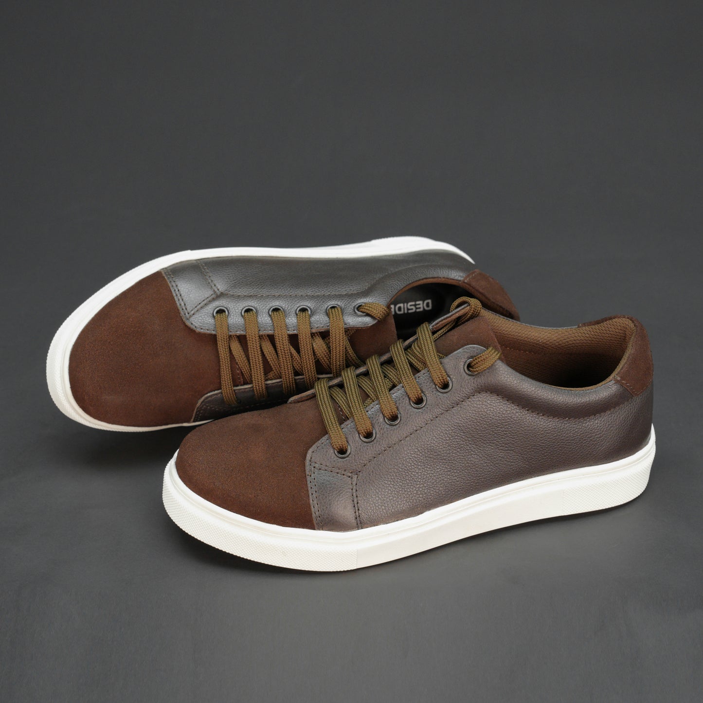 Stylish sneaker made from cow grain and cow suede leather with breathable mesh lining, non-woven insole board, and flexible TPR sole in classic brown—durable, comfortable, and versatile for everyday wear.