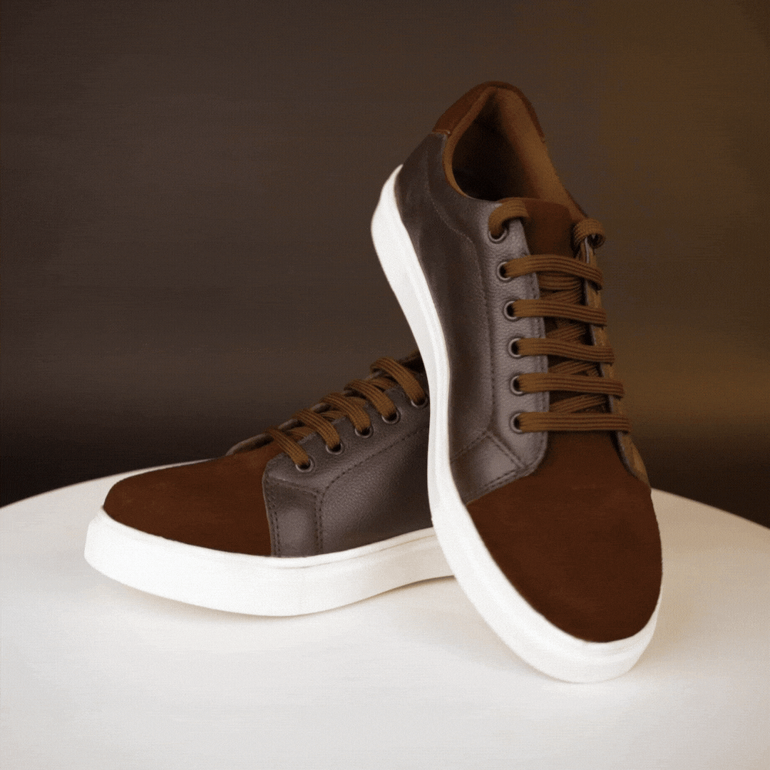 Stylish sneaker made from cow grain and cow suede leather with breathable mesh lining, non-woven insole board, and flexible TPR sole in classic brown—durable, comfortable, and versatile for everyday wear.