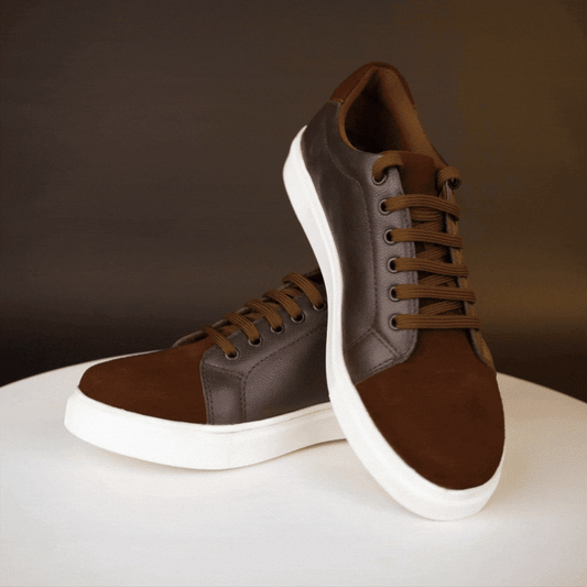 Stylish sneaker made from cow grain and cow suede leather with breathable mesh lining, non-woven insole board, and flexible TPR sole in classic brown—durable, comfortable, and versatile for everyday wear.