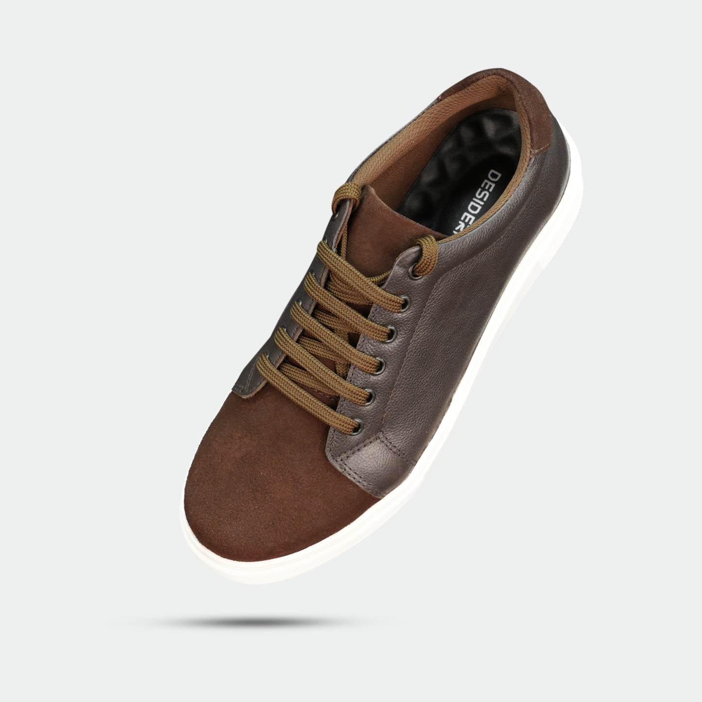 Stylish sneaker made from cow grain and cow suede leather with breathable mesh lining, non-woven insole board, and flexible TPR sole in classic brown—durable, comfortable, and versatile for everyday wear.
