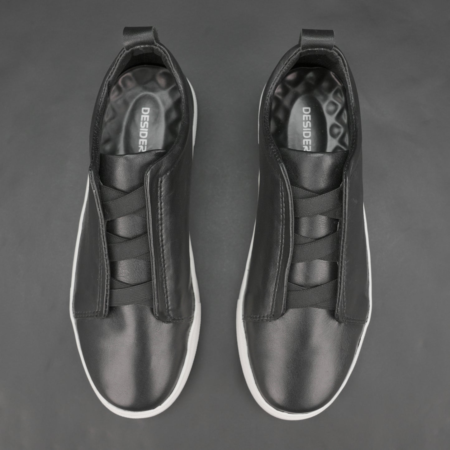 Brando sneakers made from soft Sheep Hanoi leather with cow leather lining, supportive non-woven insole, and durable TPR sole in black-white—stylish and comfortable for both formal and casual wear.