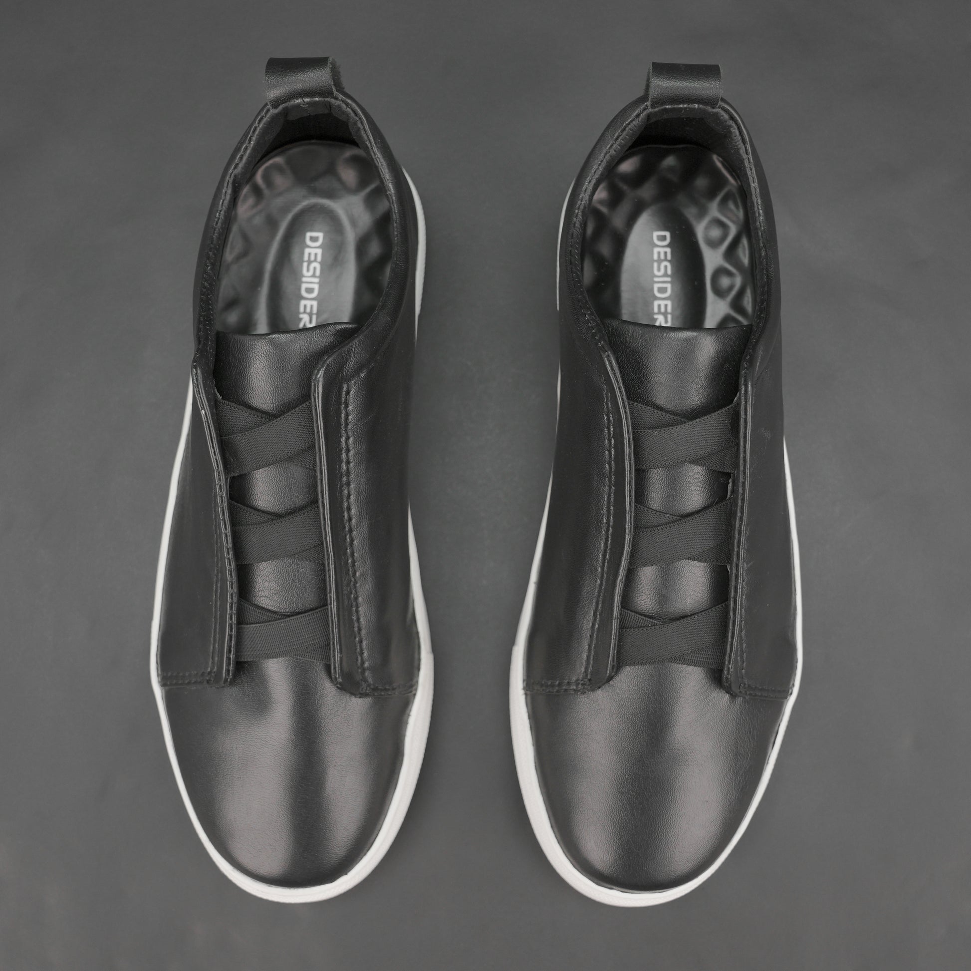 Brando sneakers made from soft Sheep Hanoi leather with cow leather lining, supportive non-woven insole, and durable TPR sole in black-white—stylish and comfortable for both formal and casual wear.