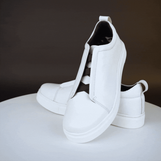 Brando sneakers in soft Sheep Hanoi leather with cow leather lining, supportive non-woven insole, and durable TPR sole—finished in black-white, stylish and comfortable for both formal and casual occasions.