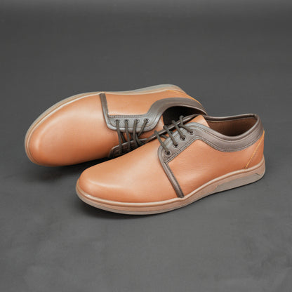 Tan shoes made from premium Cow Chalsia leather with breathable mesh lining, supportive non-woven insole, and durable TPR sole—comfortable, reliable, and perfect for everyday casual wear and light outdoor activities.