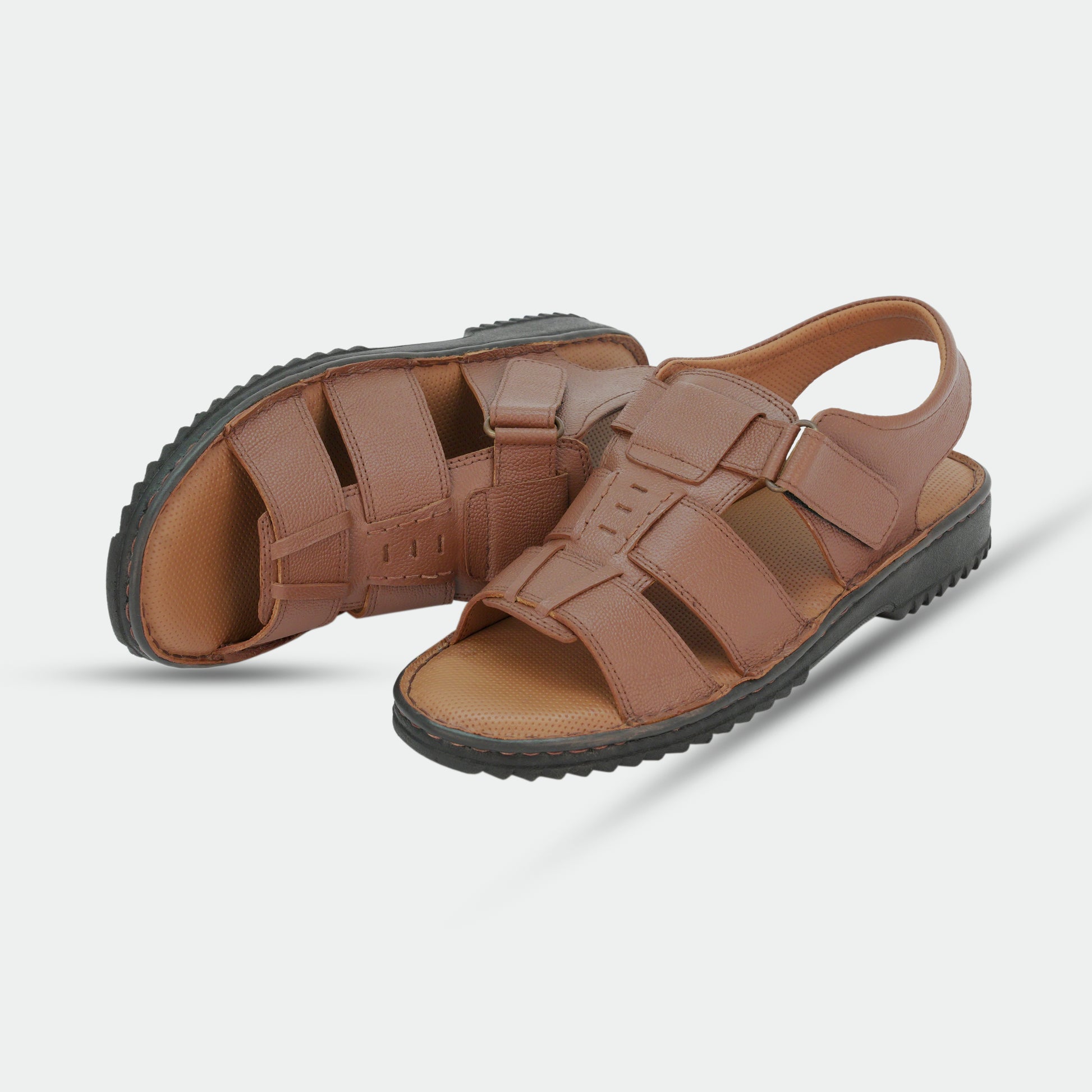 Tan sandals in 100% genuine leather, handmade for comfort and durability—classic, timeless design suitable for traditional wear or everyday use.