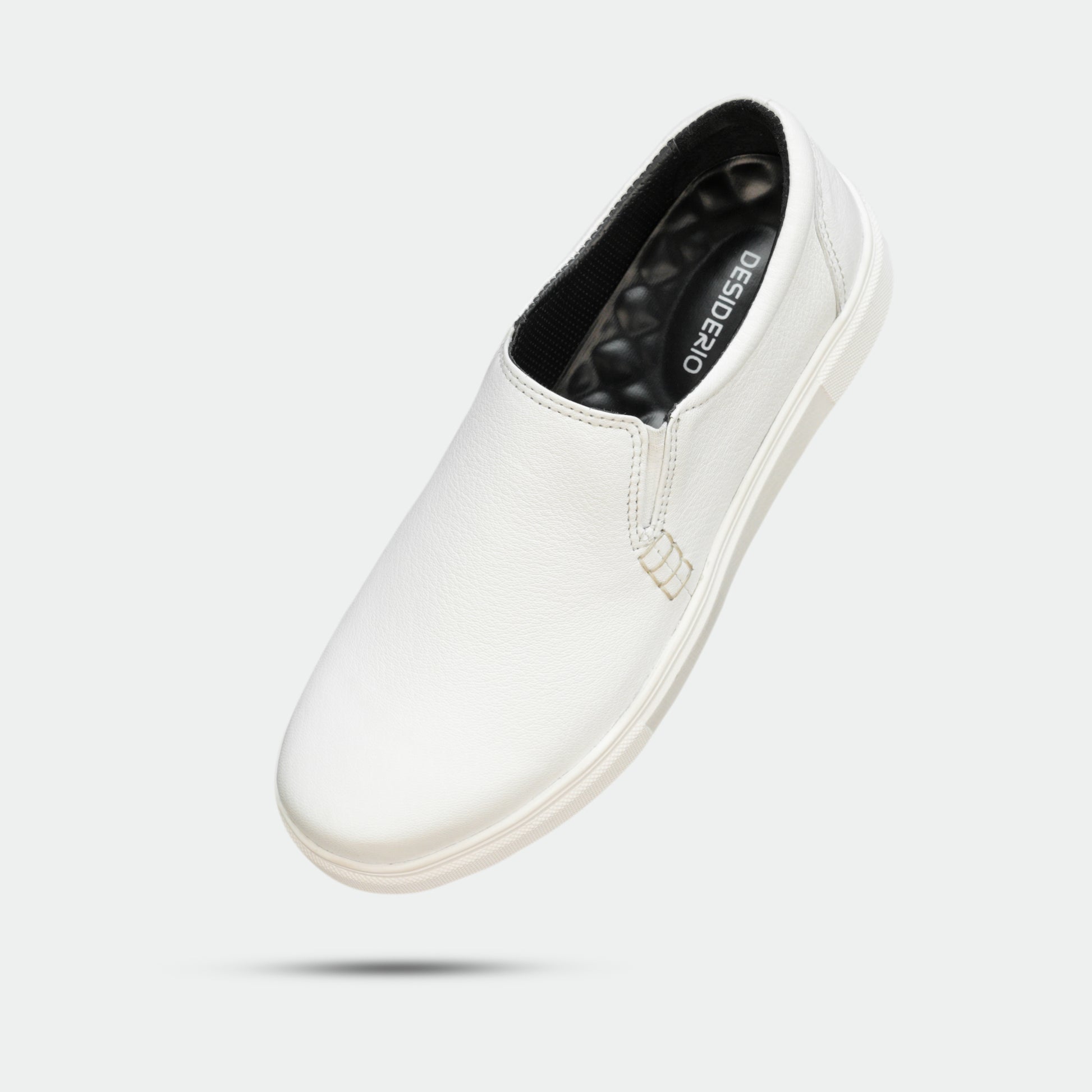 White slip-on sneakers crafted from premium Cow Chelsia leather with soft sheep leather lining, non-woven insole, and durable TPR sole—comfortable, flexible, and suitable for both formal and casual occasions.